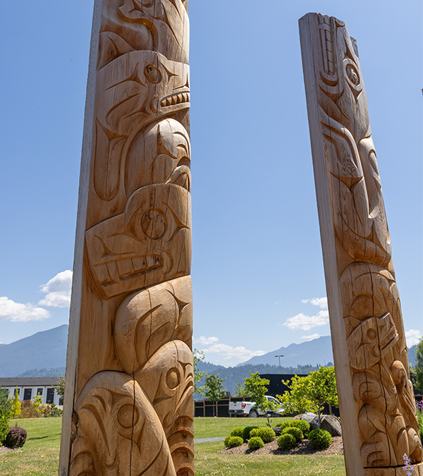 Group of People in circle with flag