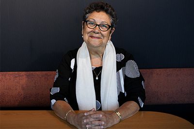 Image of woman speaking with microphone 
