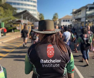 bachelor institute lady wit back to camera