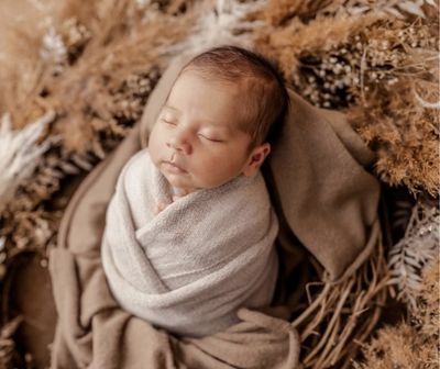 Baby wrapped in bunting