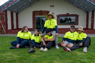 two children smiling playing hand clapping games