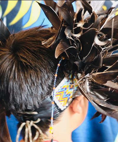 boy in headdress
