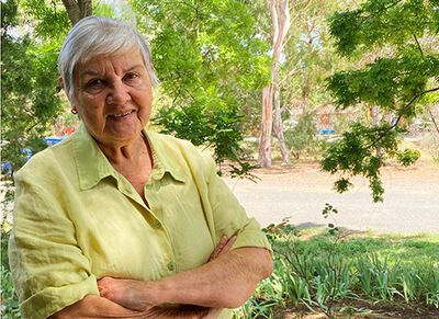 Image of woman speaking with microphone 